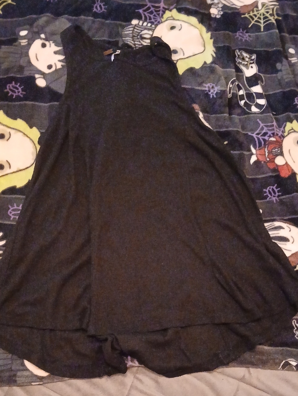 Poof! Black Sleeveless Tank Swing Top